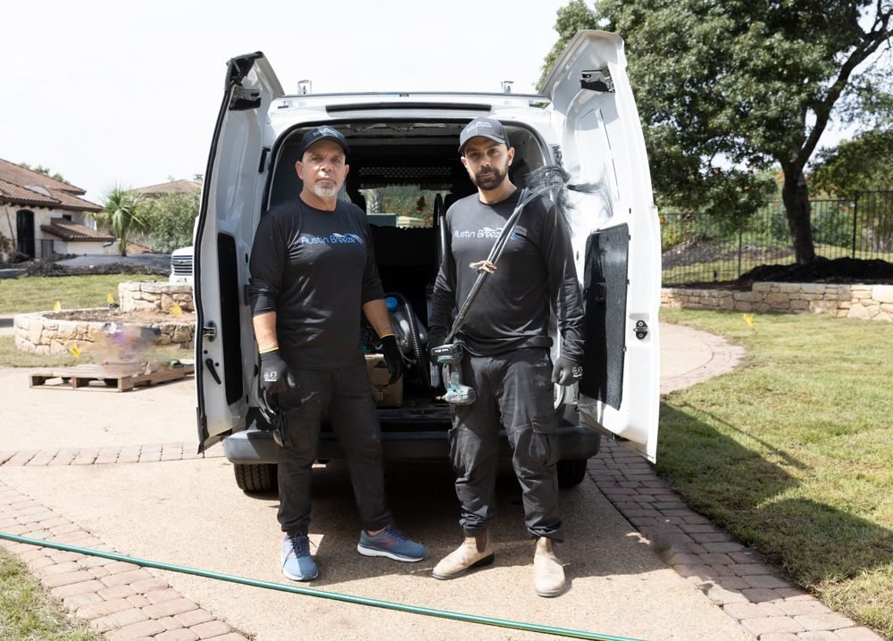 The Austin Breeze team with their service van